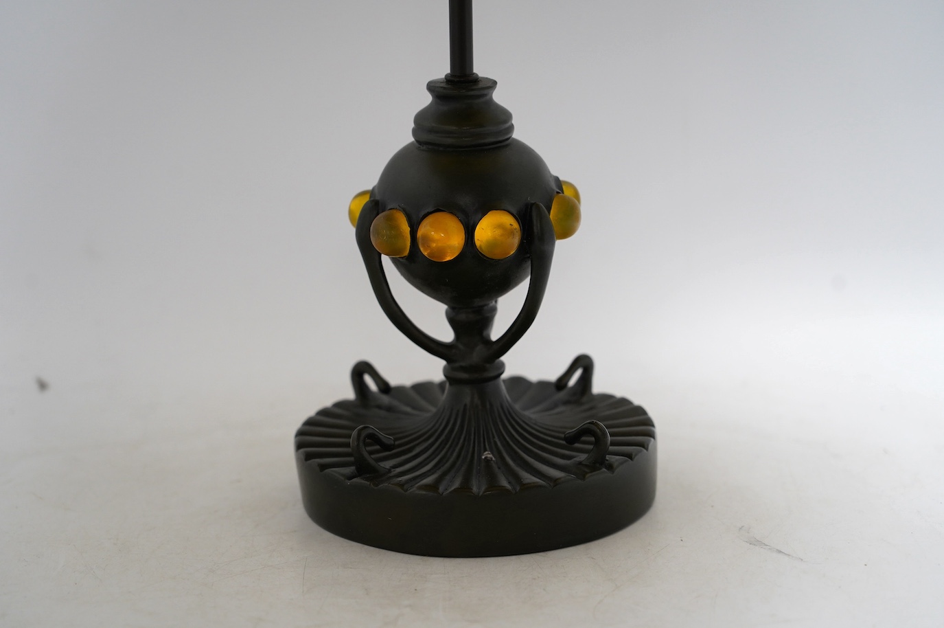 A Tiffany style coloured glass ceiling shade with pendant chains, 63cm high overall. Condition - fair to good.